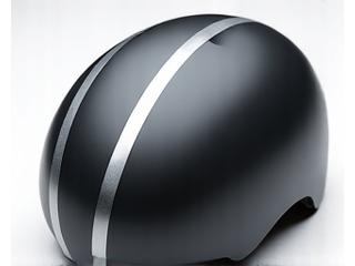 Reflective tape strategically placed on a cycling helmet for head-level visibility